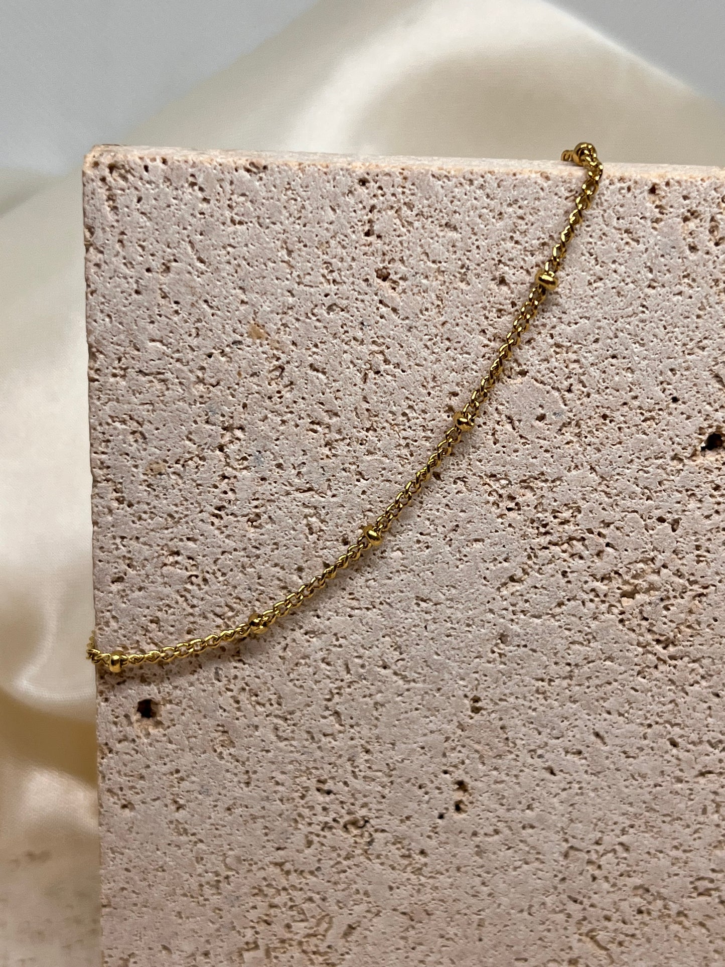 Bracelet chaîne perlé